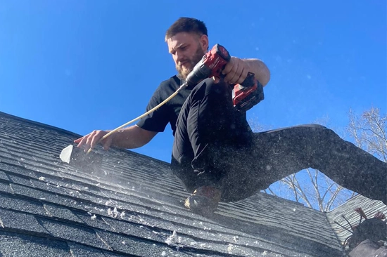 Cleaning a dryer vent on the roof in Snellville by MMI