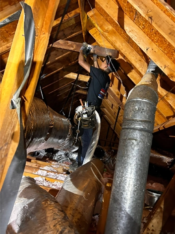 Expert Technicians Installing HVAC Ductwork in Georgia