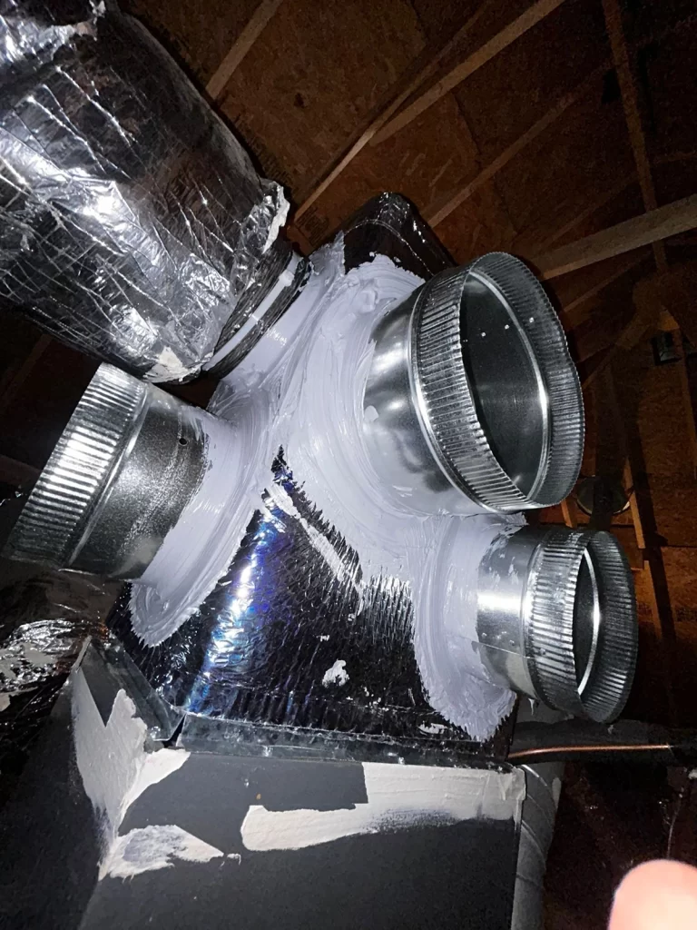 Technician Installed Air Ducts for Efficient HVAC System, Protecting Against Water or Mold Damage