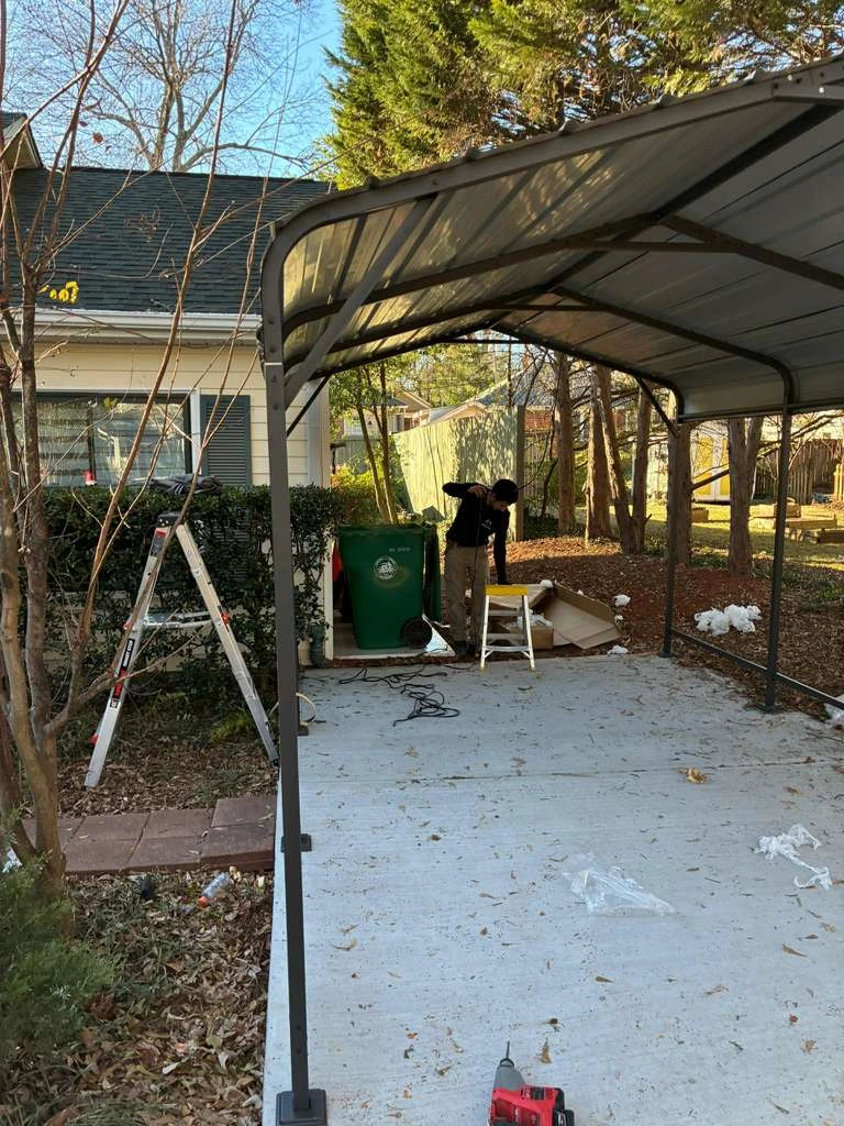 A metal carport installation